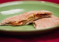 Online-34 This New Year, staying healthy can be easy with this delicious pizza-pita recipe. PHOTO BY BRITTANY RUESS / THE JOURNAL