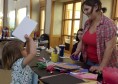 Ally Hennessey thanks Lilly Dumar for the cards and the donations that Dumar collected during her Buckets of Love fundraising event in the UC. PHOTO BY CAILLIN MURRAY
