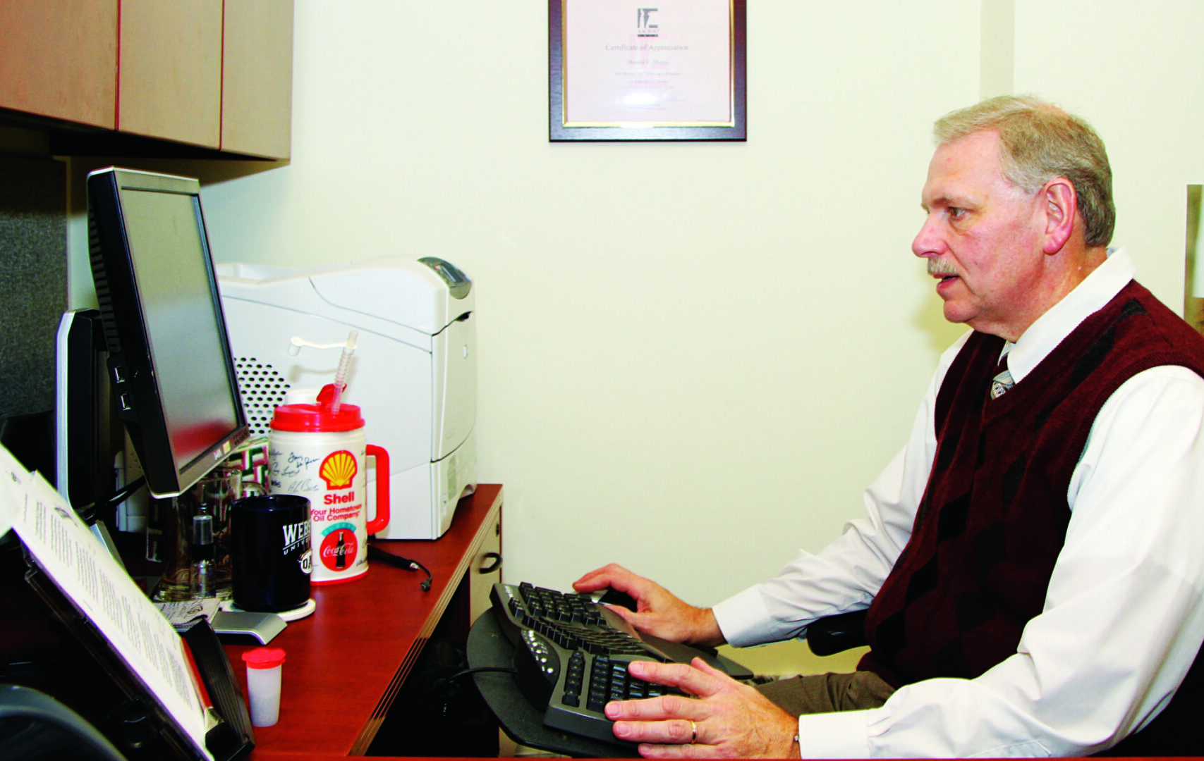 Man working at a desk computer