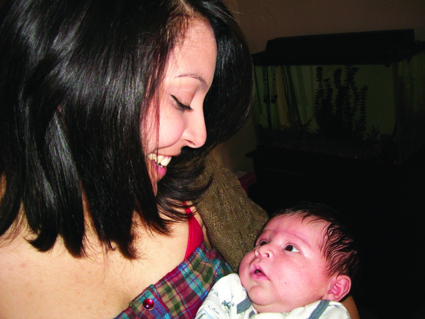 Woman holding newborn baby