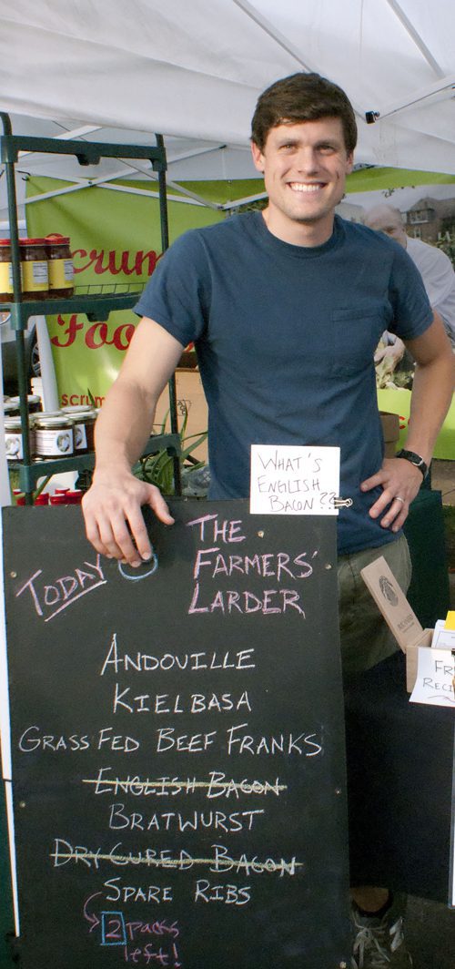 Vendor with chalkboard menu