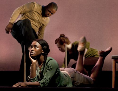 Stage performers in expressive poses