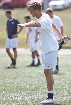 Jacob Stieb, junior defender, stretches with the Webster University men’s soccer team on Sept. 3. He has started all ten games for the Gorloks this season. PHOTO BY CLAIR STAPLES