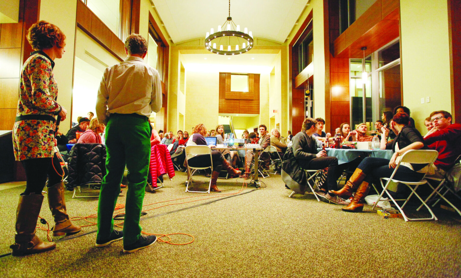 People attending a meeting in a hall