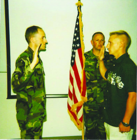 Photo Contributed by Tony Bryan Lieutenant Colonel Mark Weber (left) reenlists Tony Bryan (right). Bryan said Weber played a role in his decision to attend drill sergeant school. 