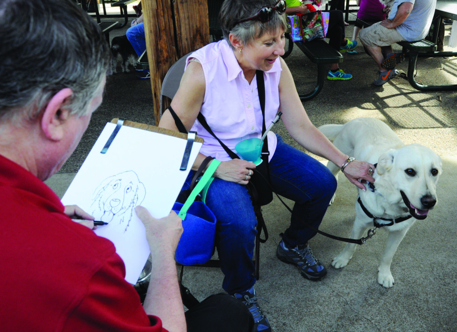 Outdoor sketch session of woman and dog