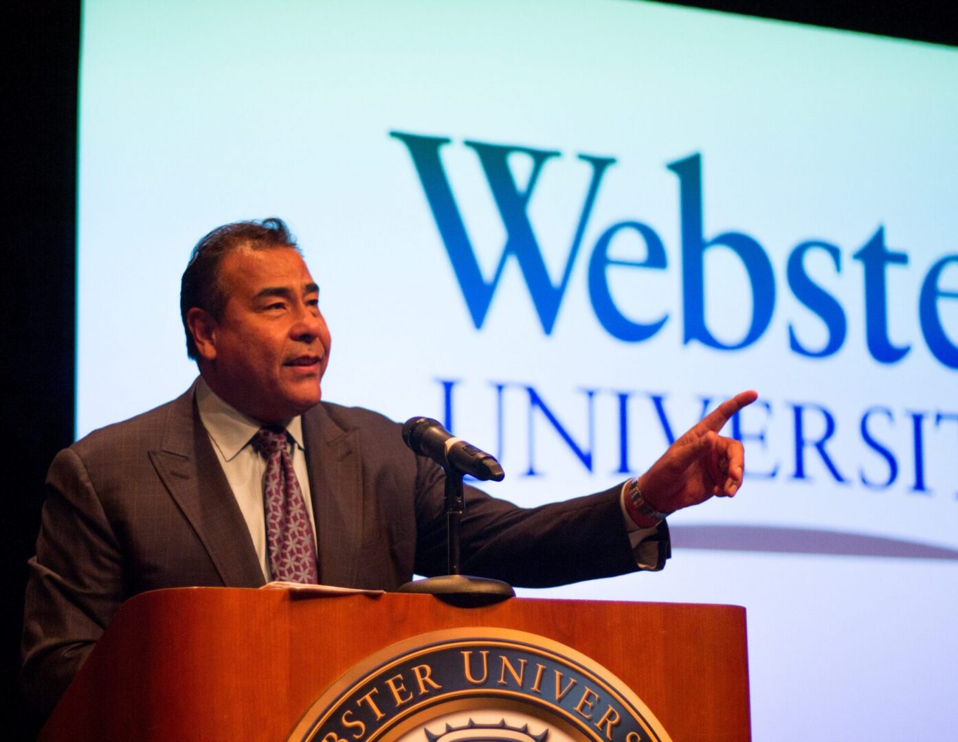 Speaker at Webster University podium