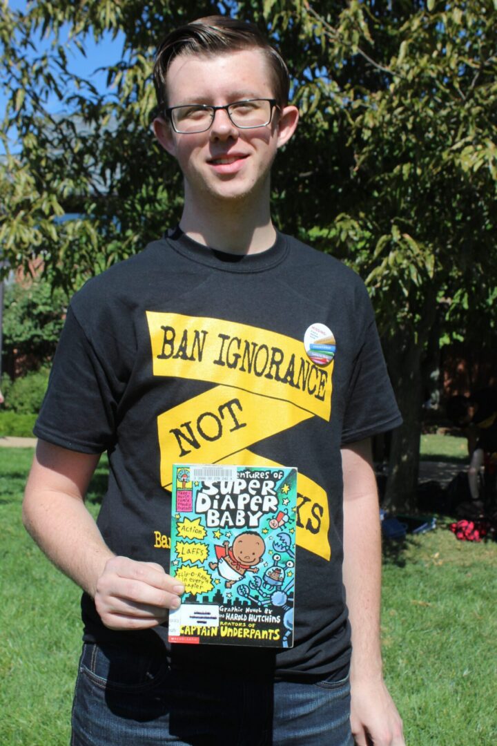 Individual wearing a "Ban Ignorance" shirt