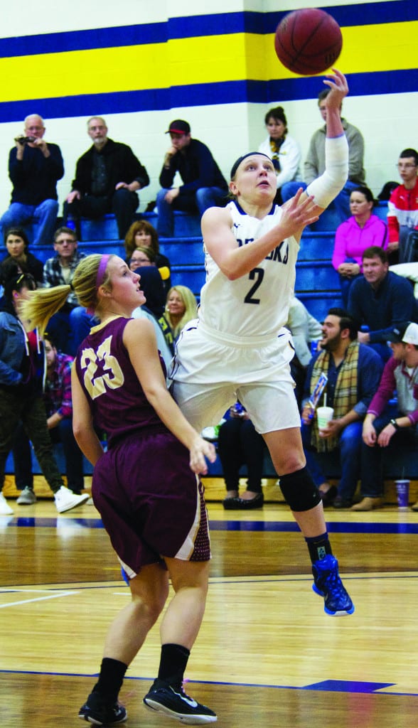 VICTORIA CASWELL/The Journal Ashley Brooks goes up for a layup in Webster’s win over Eureka College. 