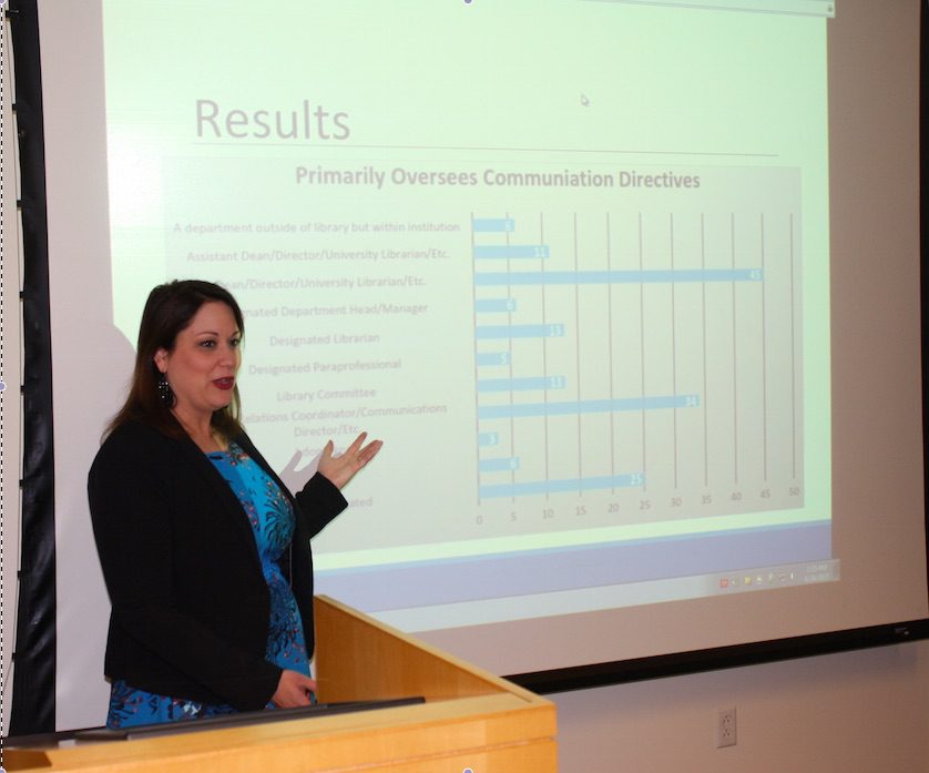 Presentation with bar chart and speaker