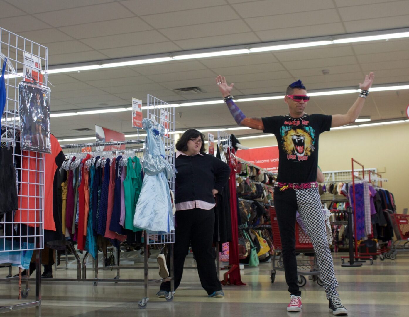 Colorful outfits and shopping racks