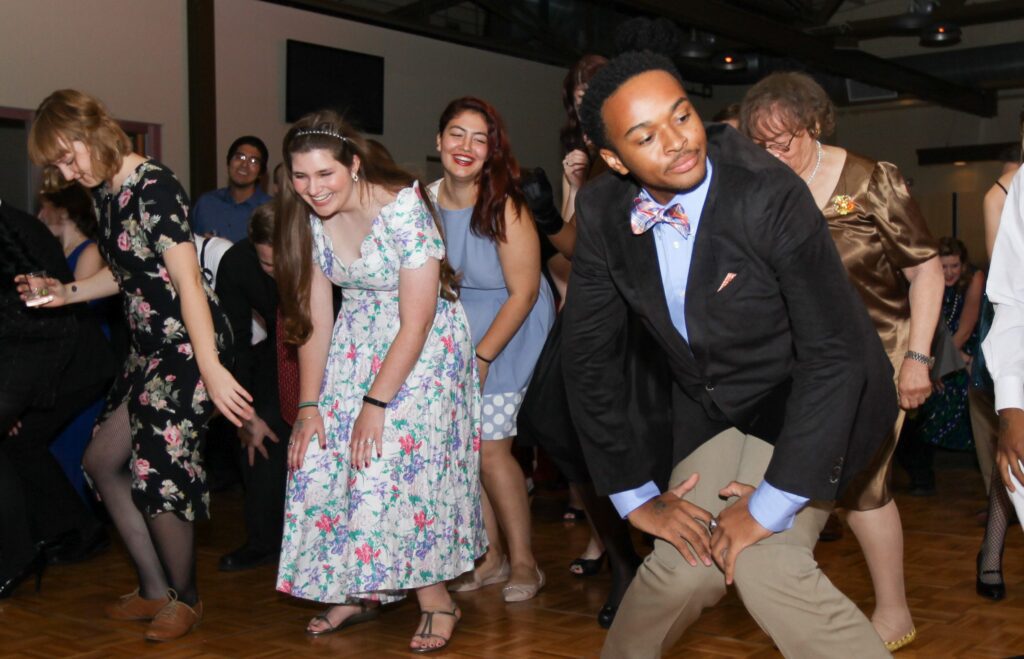 People dancing at lively party
