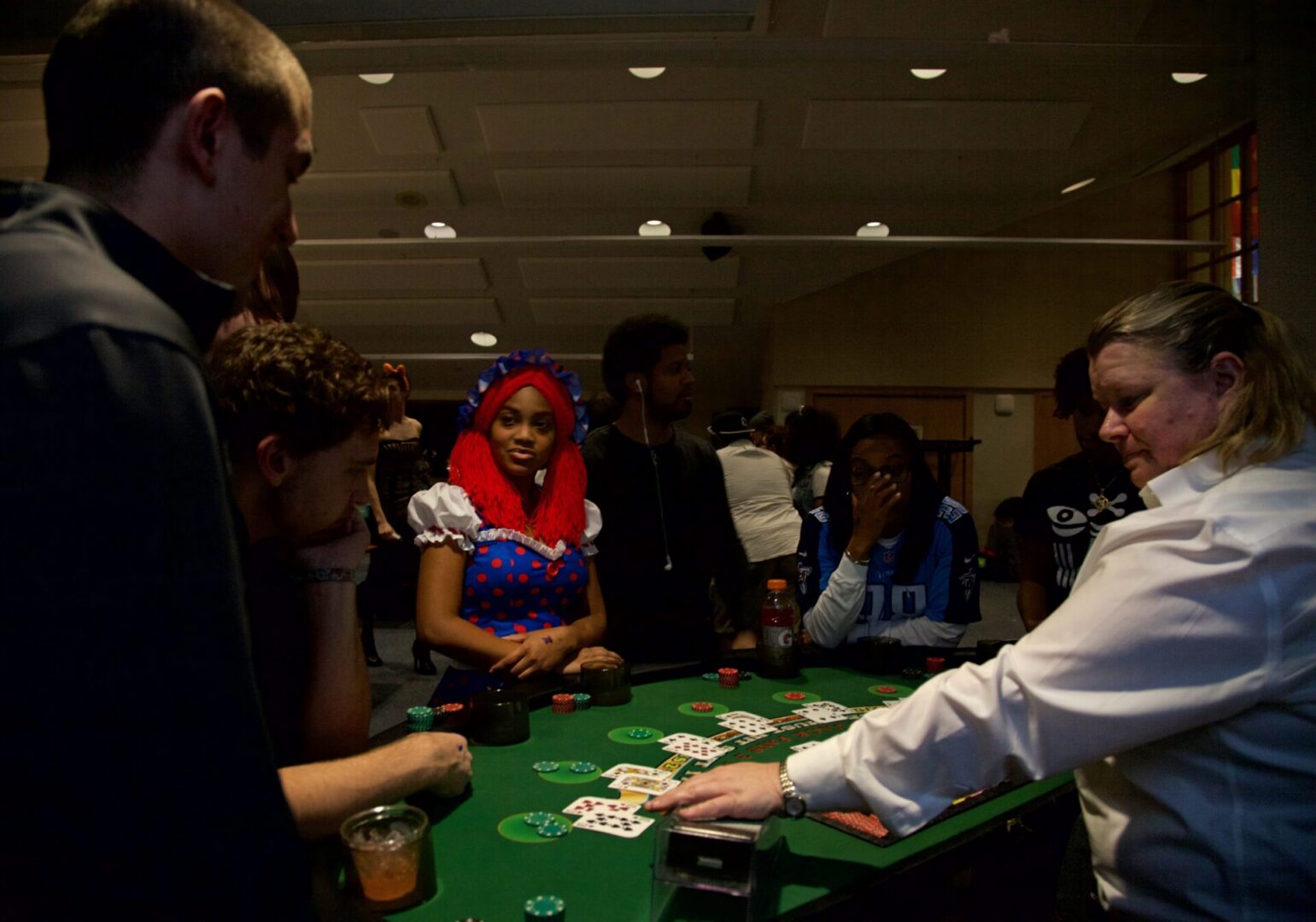 People playing poker at a casino table