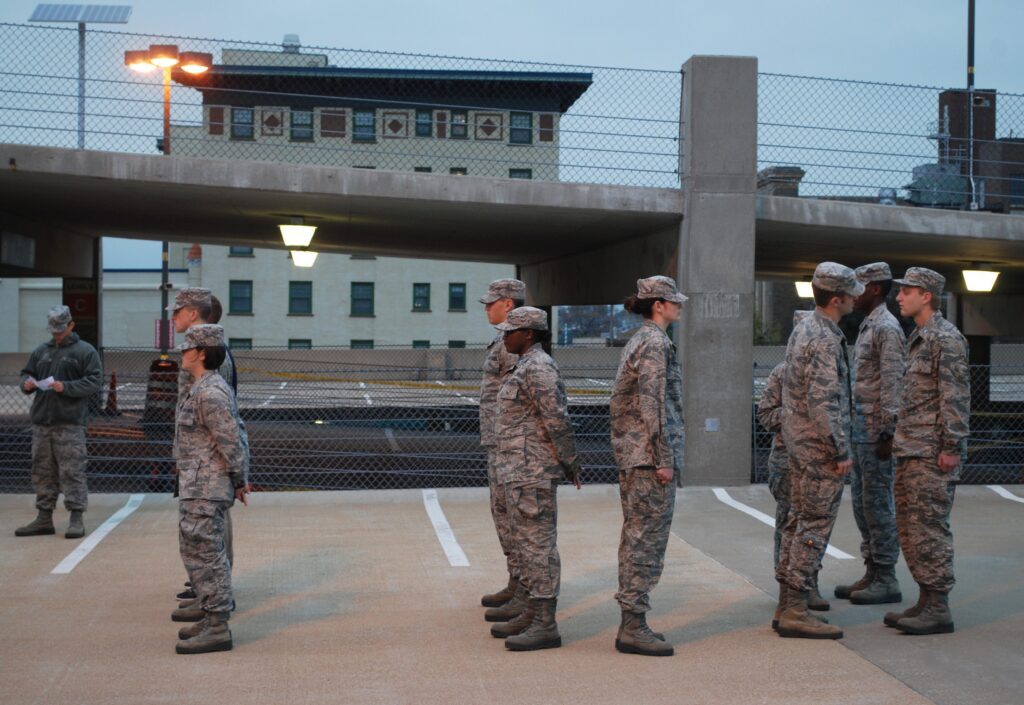 Military personnel in line on rooftop