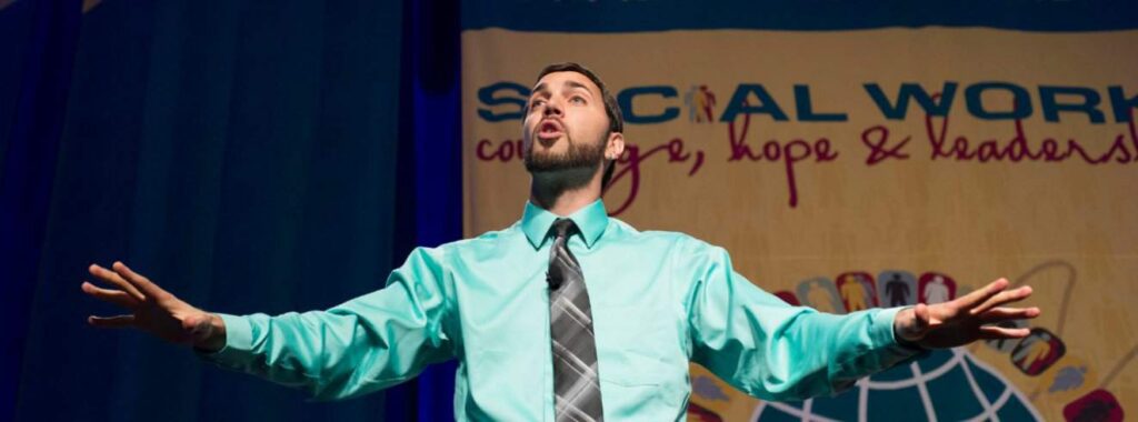 Presenter gesturing energetically during talk