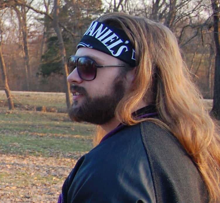 Person with flowing hair enjoying a park