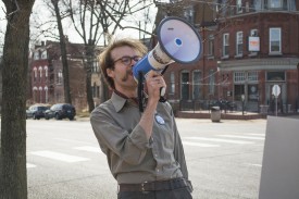 Webster student Wes Schnitker rallies for Bernie Sanders March 6 at the People’s March for Bernie on Cherokee Street. He was arrested for protesting Friday at the St. Louis Donald Trump rally at the Peabody Opera House. JULIA PESCHEL | The Journal