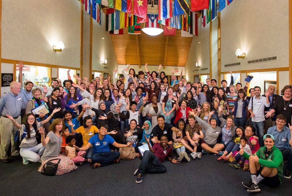 Large gathering in a hall setting