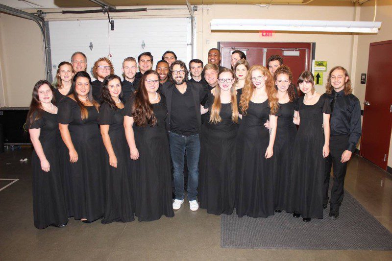 Group photo of choir members backstage
