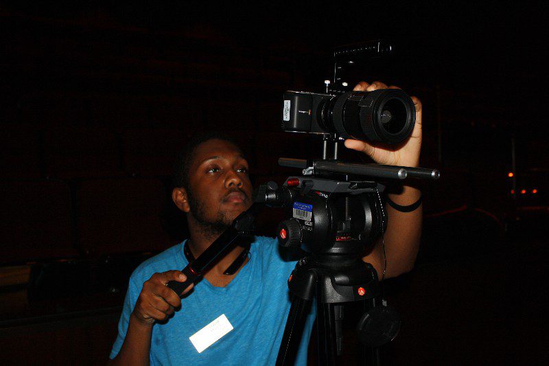 Person operating a professional video camera