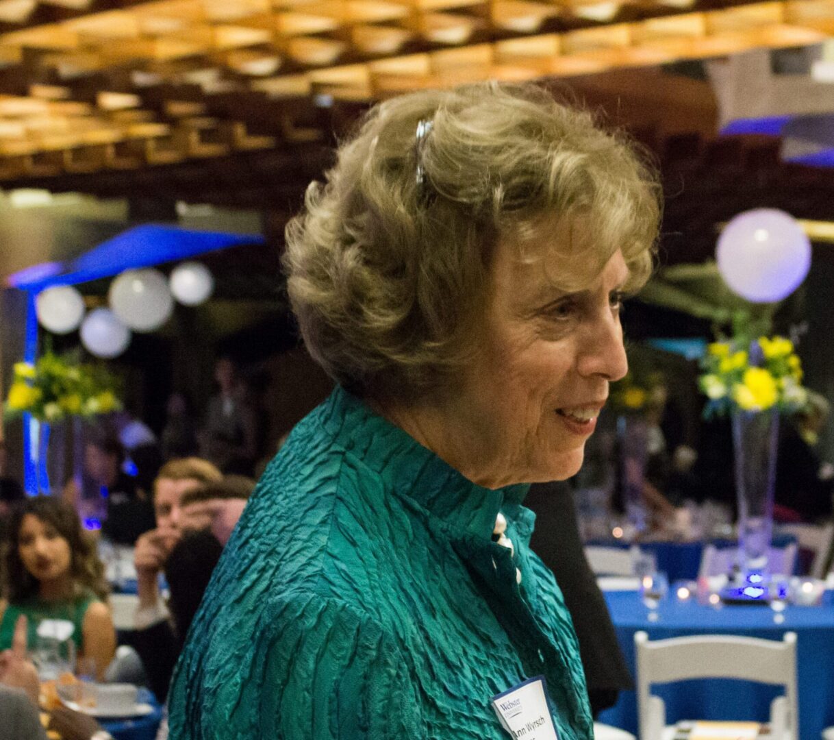 Smiling woman at festive occasion