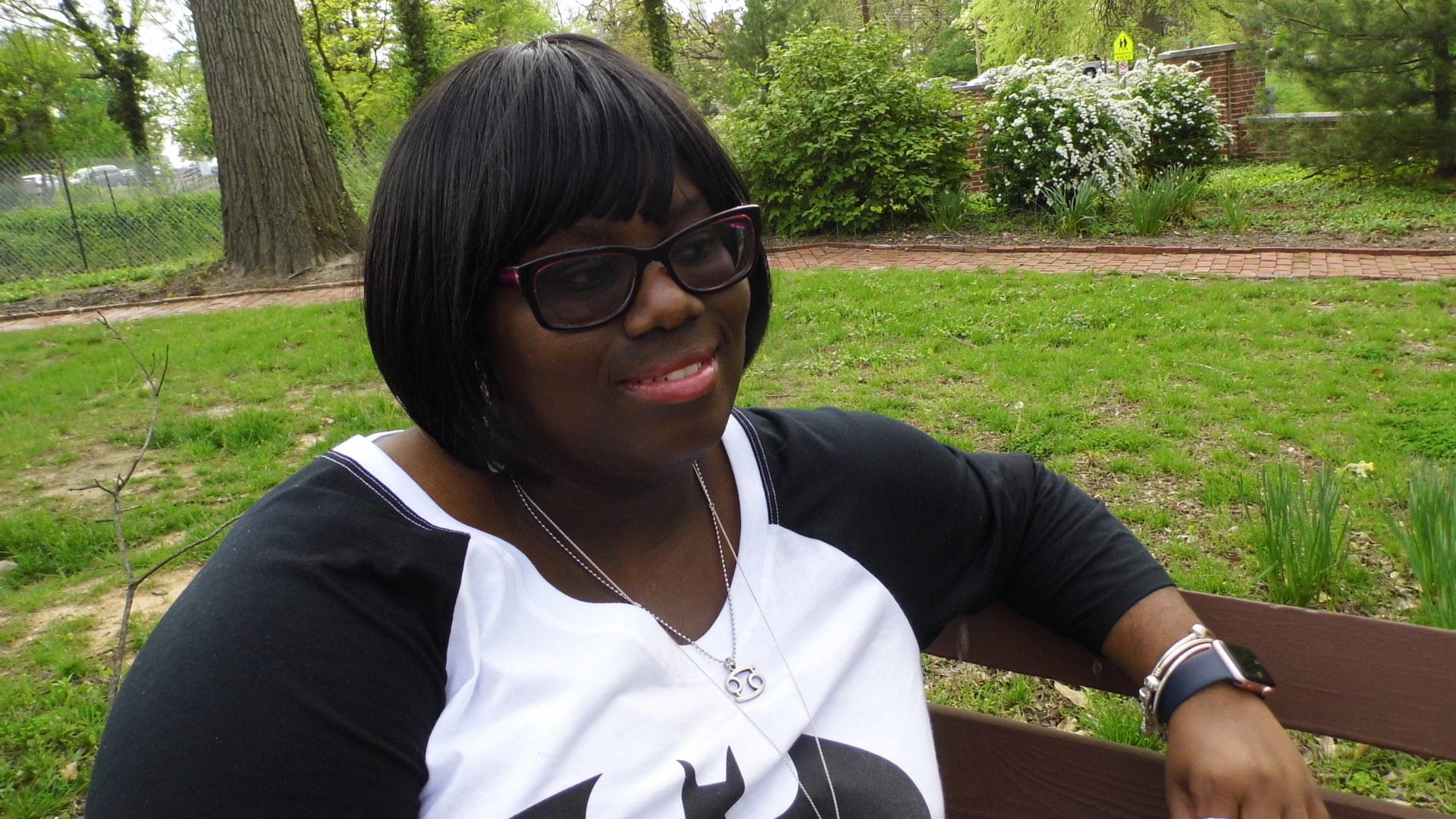 Woman sitting on a park bench