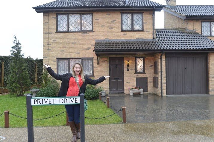 Woman posing at Privet Drive house