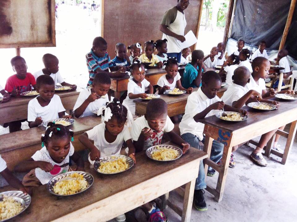 Children eating lunch in classroom setting