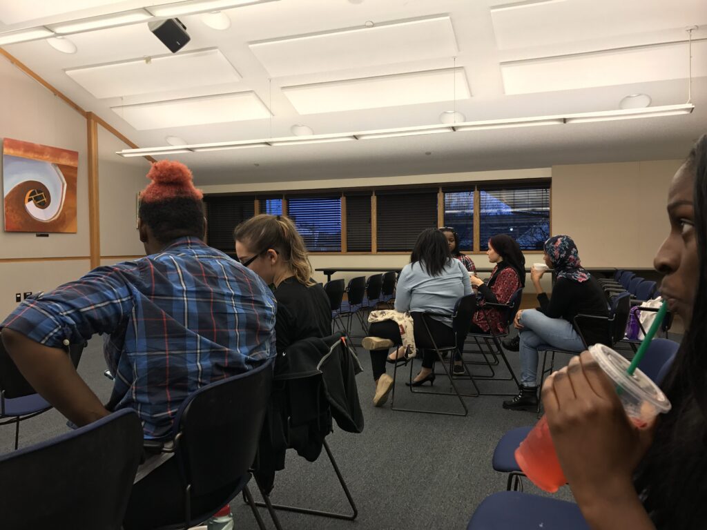 People sitting in a classroom setting
