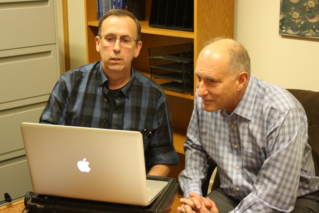 Webster University graduate student Michael Sandknop gets advice from documentarian Eric Strange. Sandknop is working on a documentary about Francis Tumblety. The film will premiere this year at Webster May 14. BILL LOELLKE / The Journal