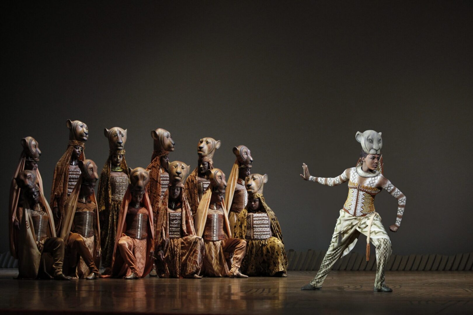 Stage performers in artistic animal attire
