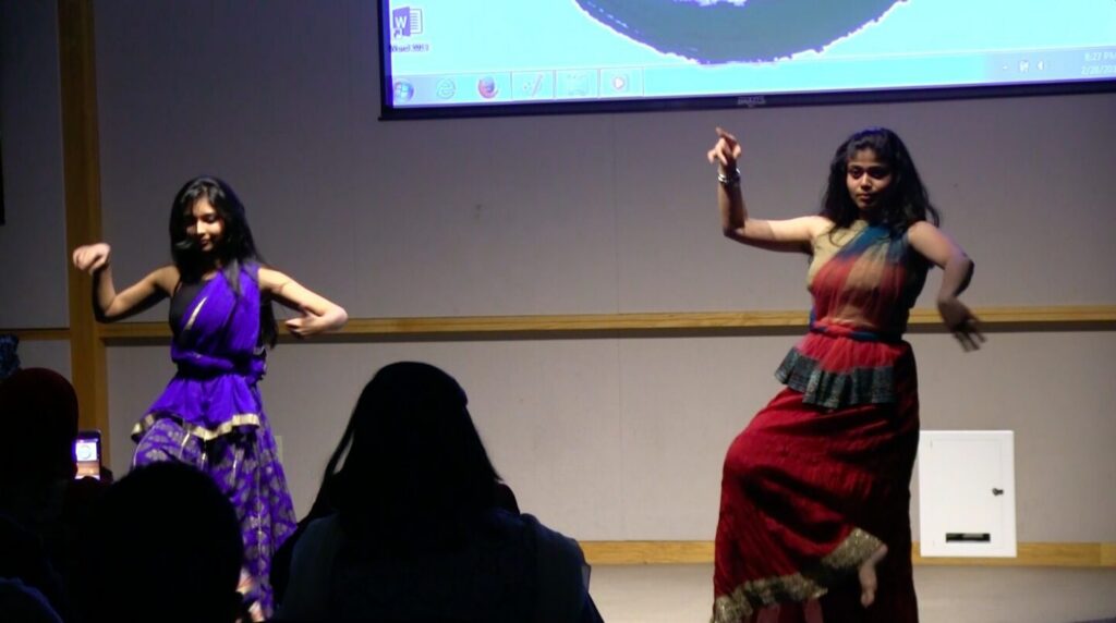 Traditional dance performance with vibrant costumes