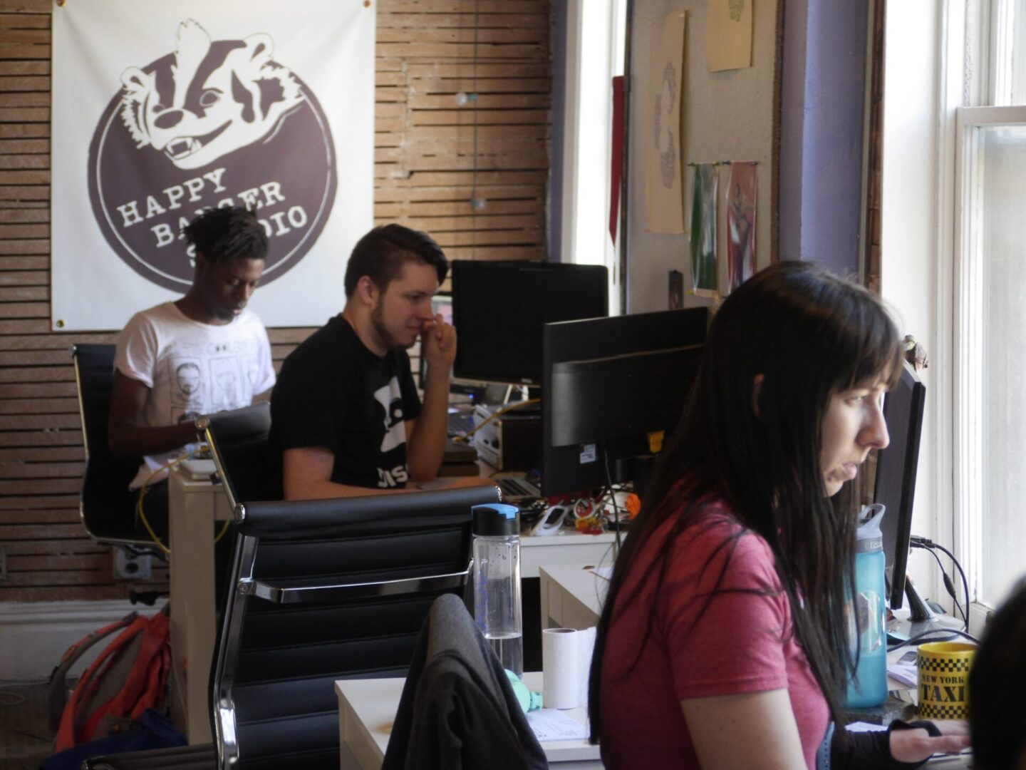 Office workers focused at their desks