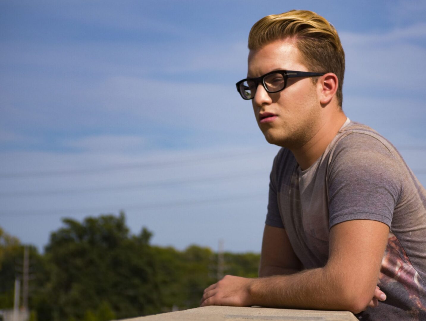 Individual in sunglasses enjoying sunny day