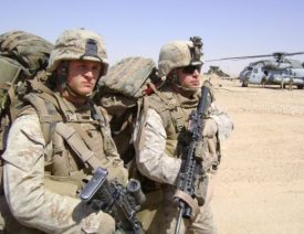 Photo Credit: Mike Nowicki Tom Palozola and Mike Nowicki serving in Iraq together in 2007.