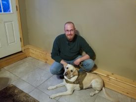 Chris West with his service dog Zivah. West met Zivah through the Missouri Patriot Paws. 