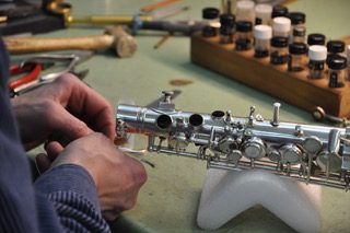 Close-up of instrument maintenance work