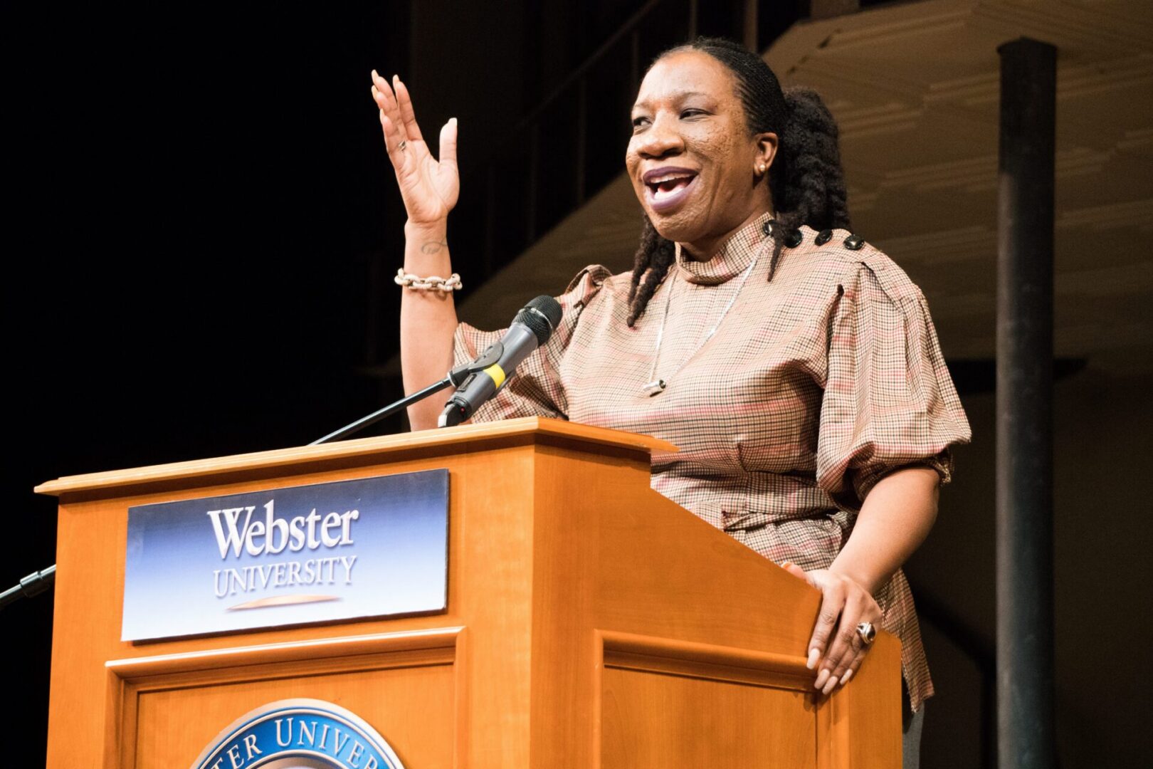 Woman giving a speech at university