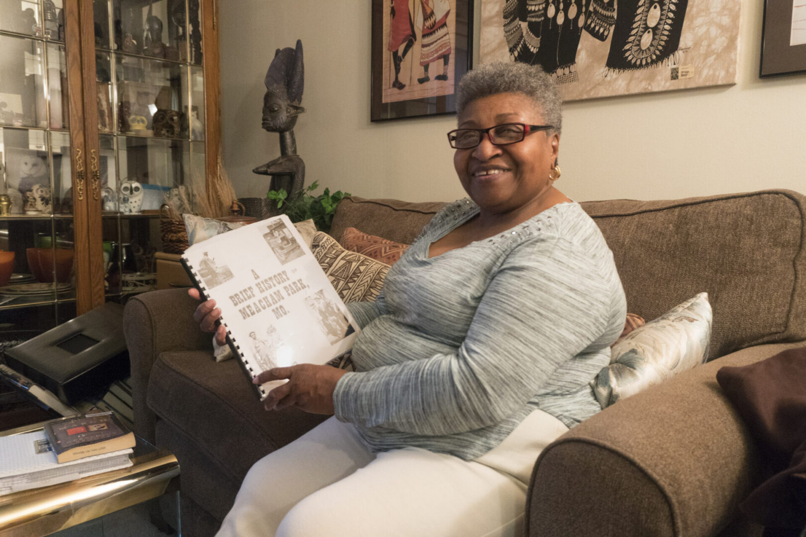 Person displaying a family photo album
