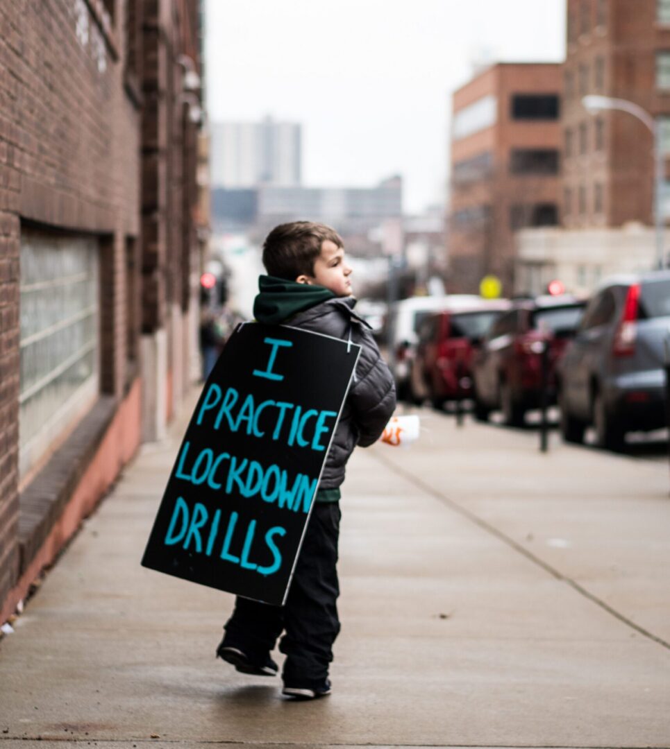 Urban scene with child and protest message