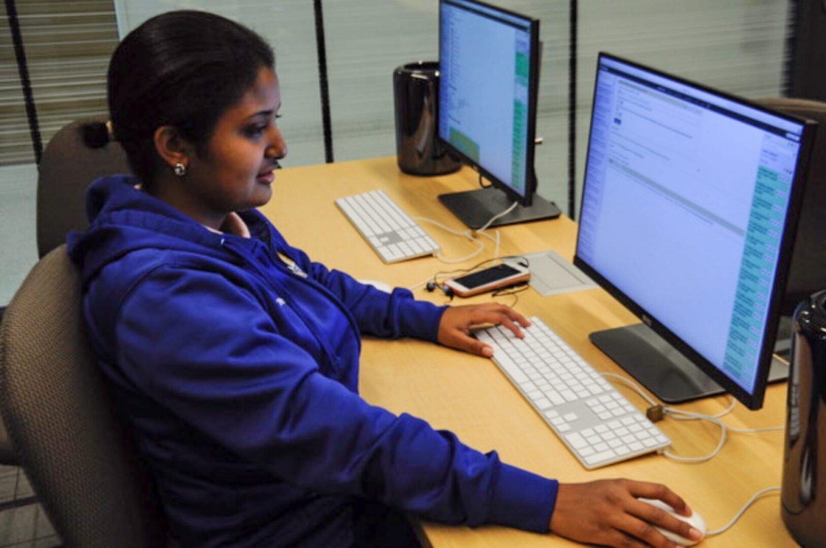 Office worker typing on keyboard