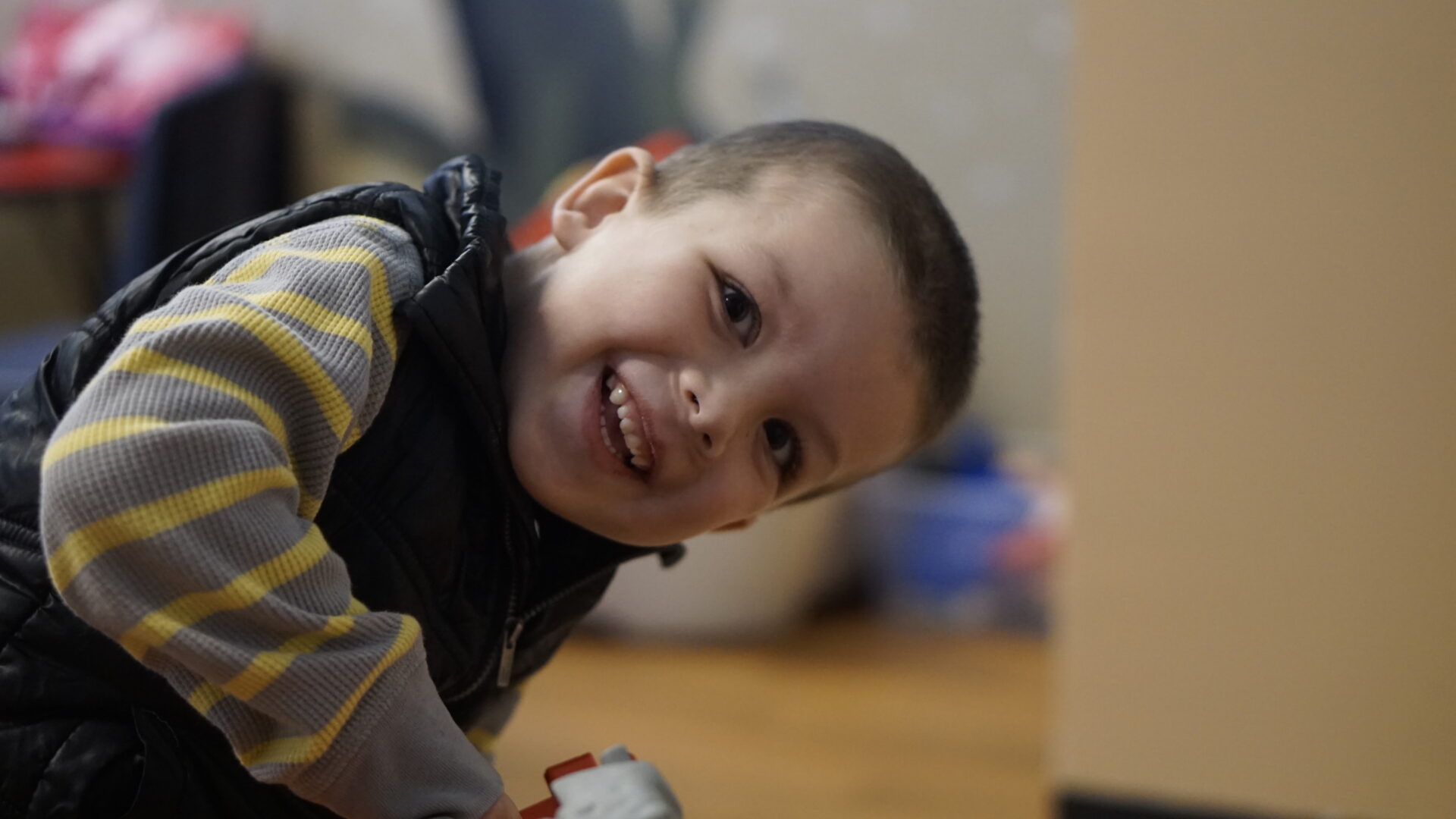 Young child with a joyful expression