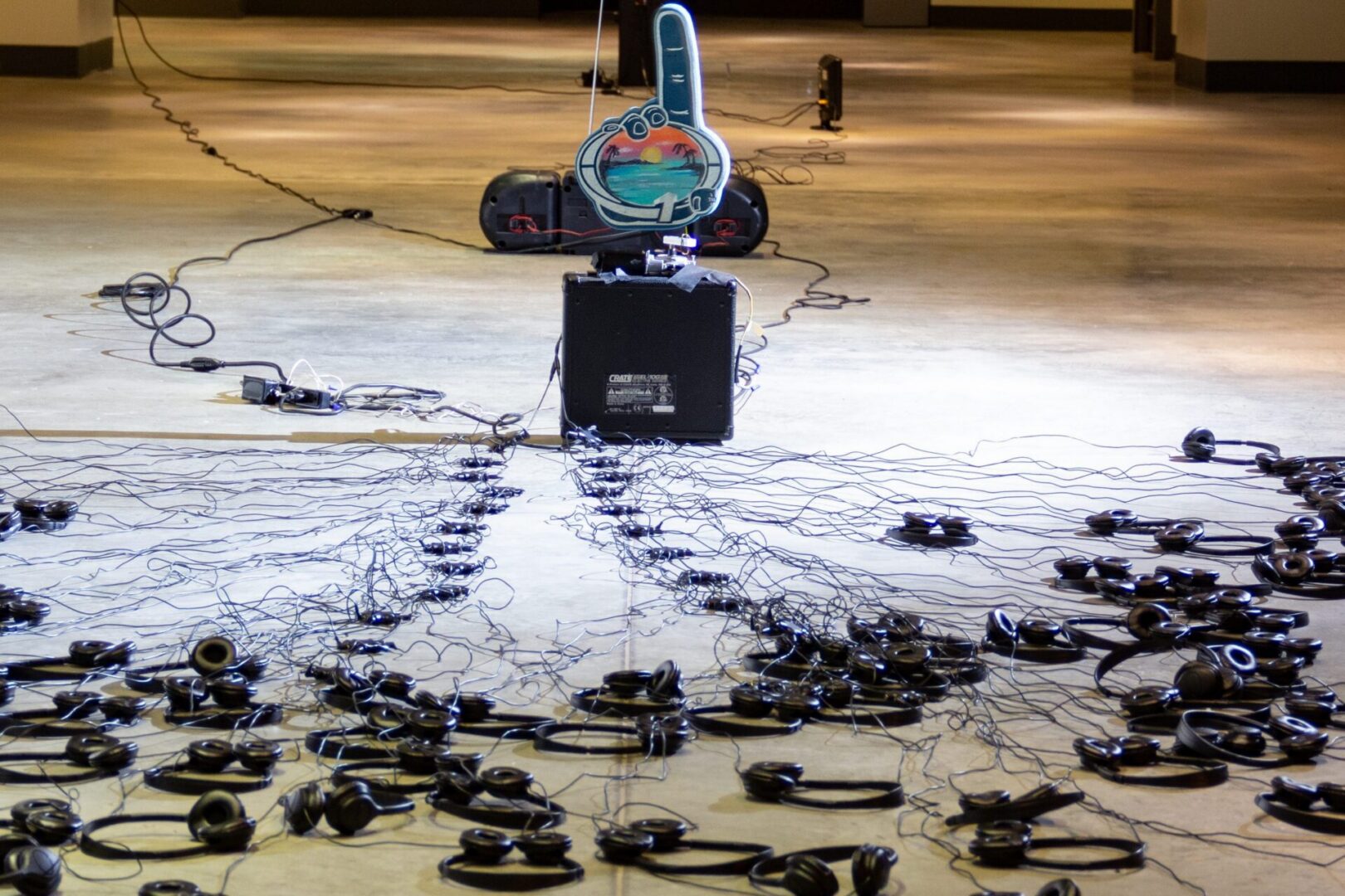 Art installation of tangled headphones and wires