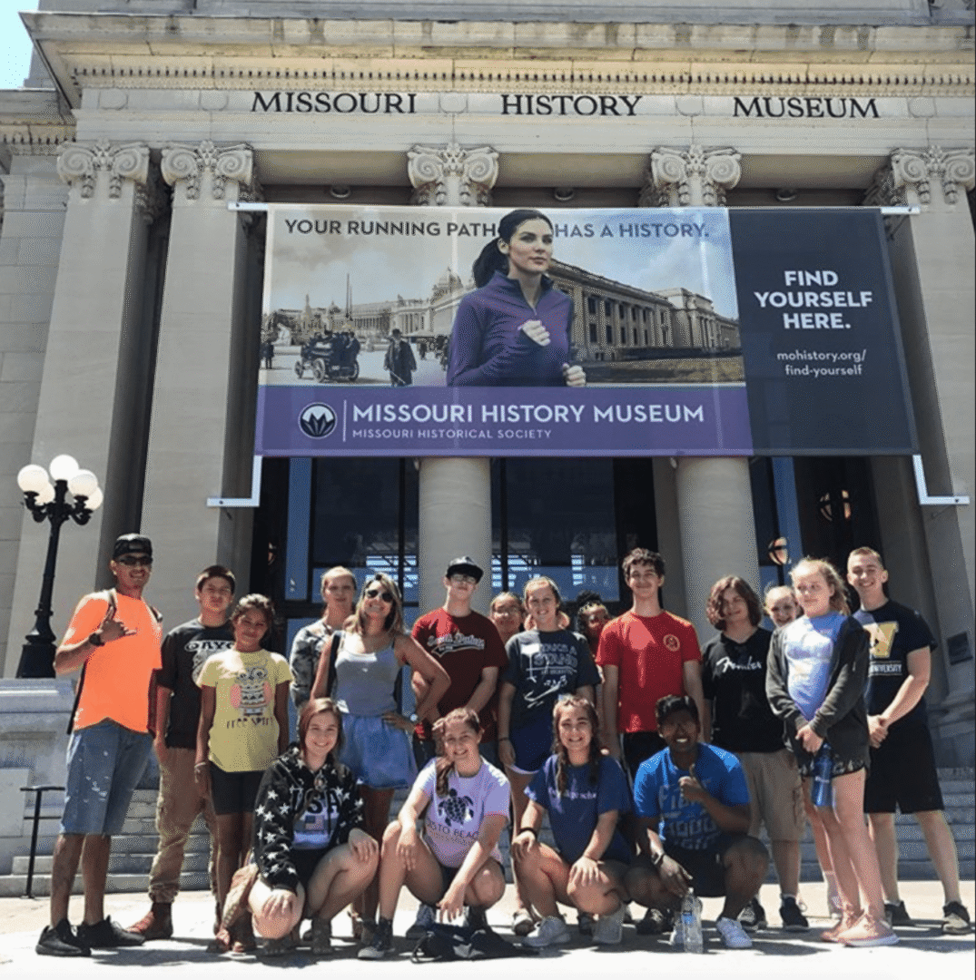 Students pose outside Missouri History Museum