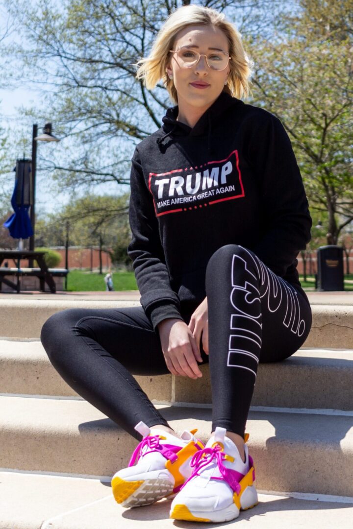 Person wearing colorful sneakers on steps