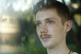 Pensive man with mustache
