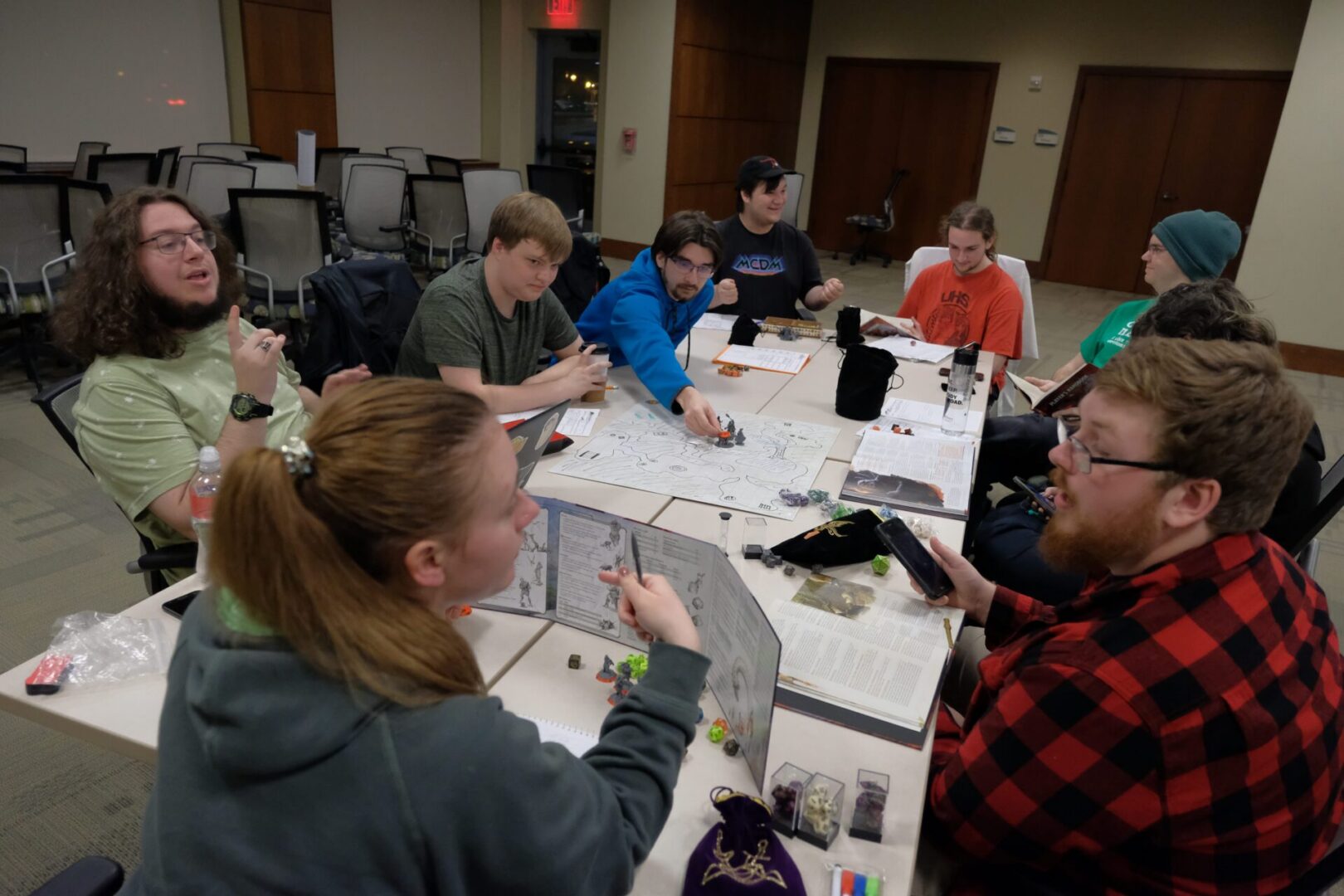 People engaged in a tabletop role-playing game