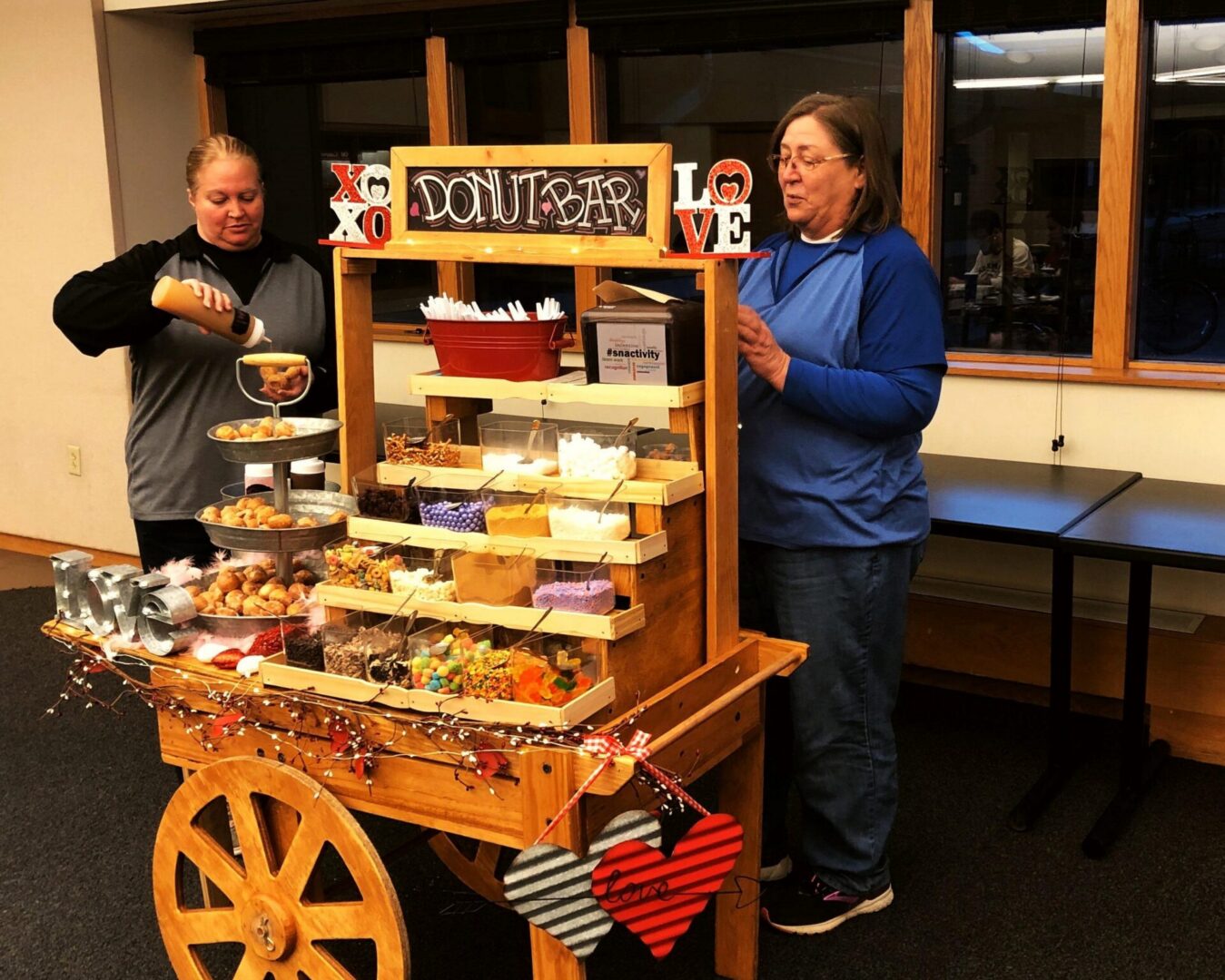 Donut bar with various toppings displayed