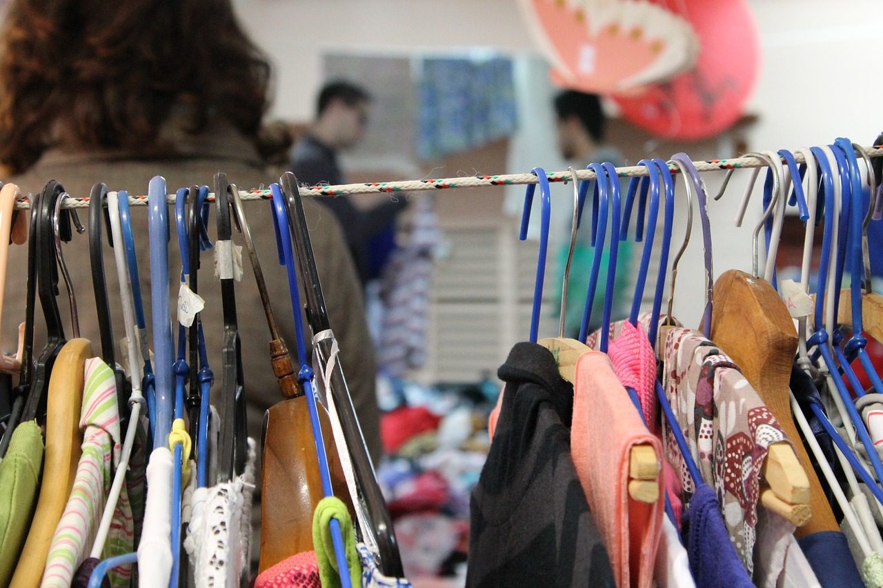 Assorted garments in a busy shop