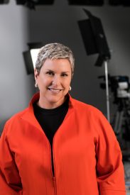 Confident woman with short hair indoors